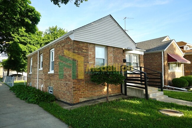 Photo - Updated 4-Bedroom Home with Finished Basement and Fenced Yard