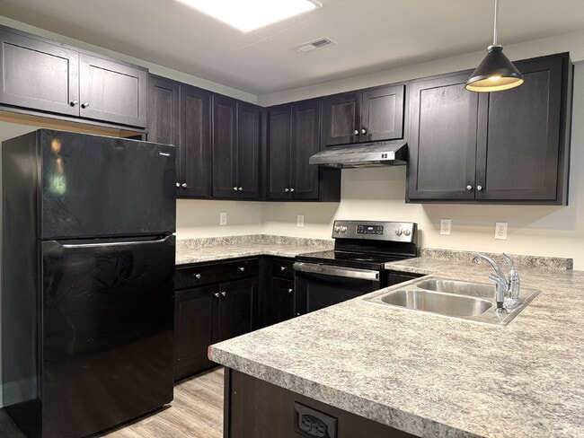 "Charming 2-Bed, 2-Bath Duplex Retreat in New Market's Idyllic Setting!"