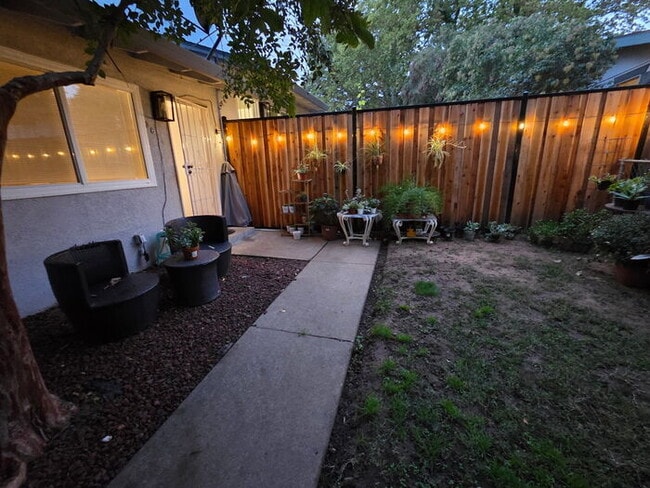 Photo - 3 bed 1 bath Duplex with garage and private yard