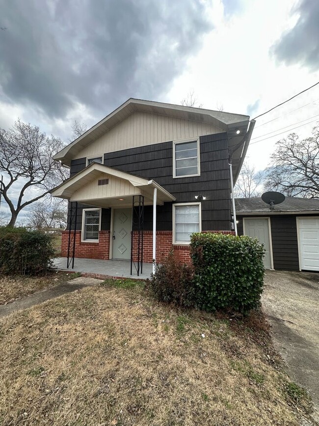 Building Photo - Spacious 3BR/2BA with Cozy Fireplace & Bright Living