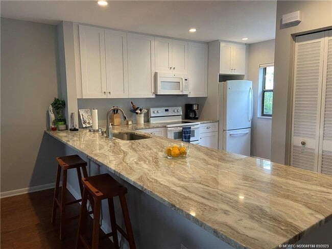 Building Photo - 3901 SE St Lucie Blvd Unit D-29