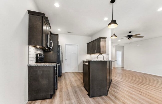 Photo - NEW LUXURY 3 BED 2 BATH 2 CAR GARAGE DUPLEX