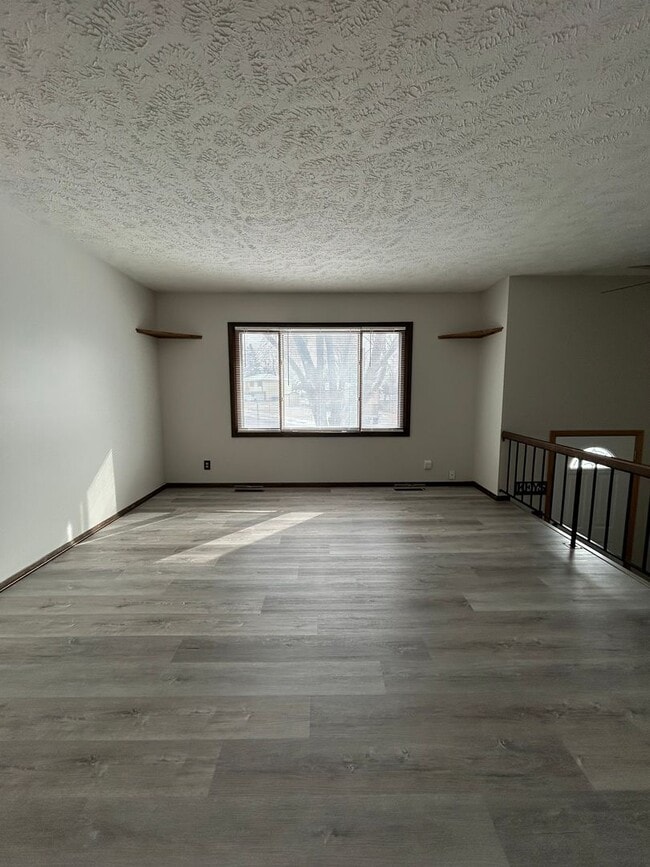 Photo - Spacious 3-Bedroom, 1-Bath Home with Garage & Basement in La Vista