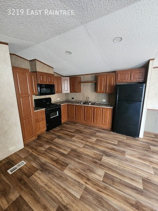 Building Photo - 3219 East Raintree-