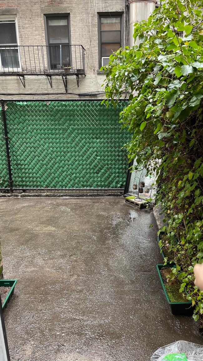 backyard - 215 E 88th St Unit 1D