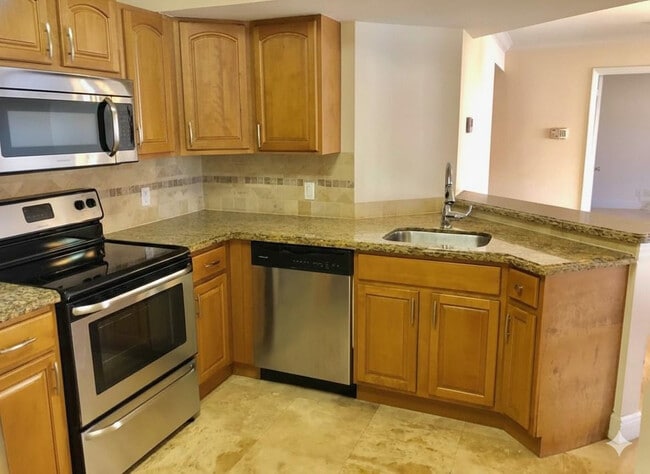 Photo - 8721 Wiles Rd Unit 104