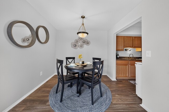 Spacious dining room area at Drawbridge Apartments in Harrison Township, MI.
