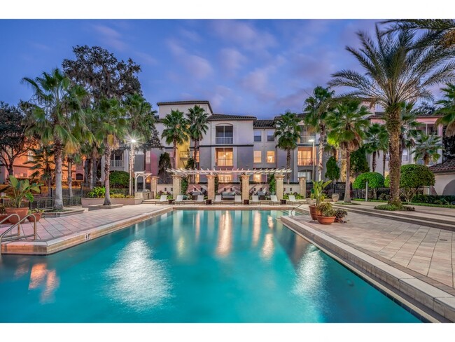 Front pool area at dusk - Sanctuary at Highland Oaks Apartments