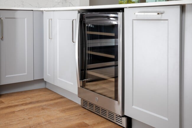 Signature Collection kitchen with stainless steel wine fridge