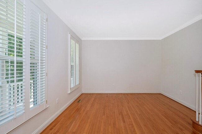 Photo - Main Level Primary Suite & Soaring Two Story Family Room