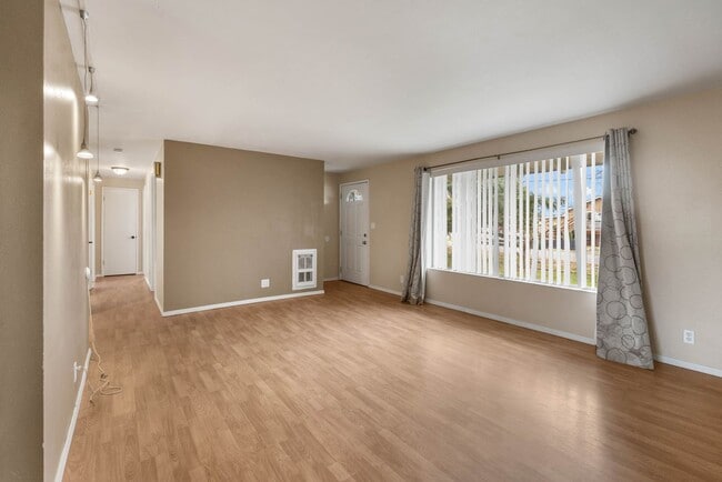 Photo - 4 Bedroom Home with Covered Parking & Fenced Backyard