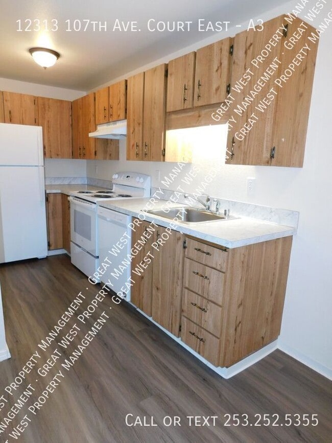 Building Photo - 12313 107th Ave Ct E Unit A3 Rental