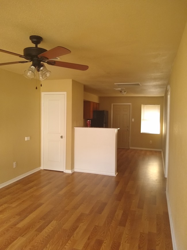 New fans, lights and flooring. Fresh paint. - 7742 Mclean St Apartment Unit B