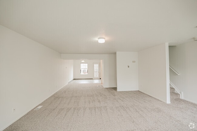 3BR, 1.5BA - 1100SF - Living Room and Dining Room