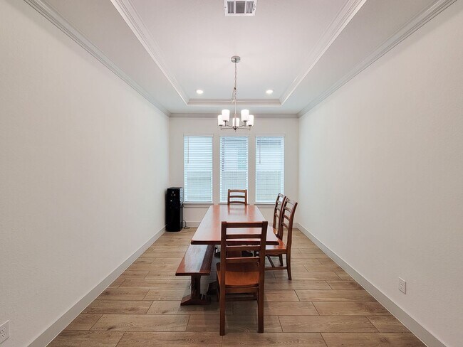 Photo - Beautiful New Home in Manvel, Texas featuring 4 spacious bedrooms and 3.5 bathrooms with 3 car ga...