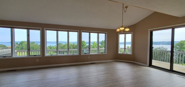 Building Photo - Lakefront End-Unit Condo with Crystal Lake...