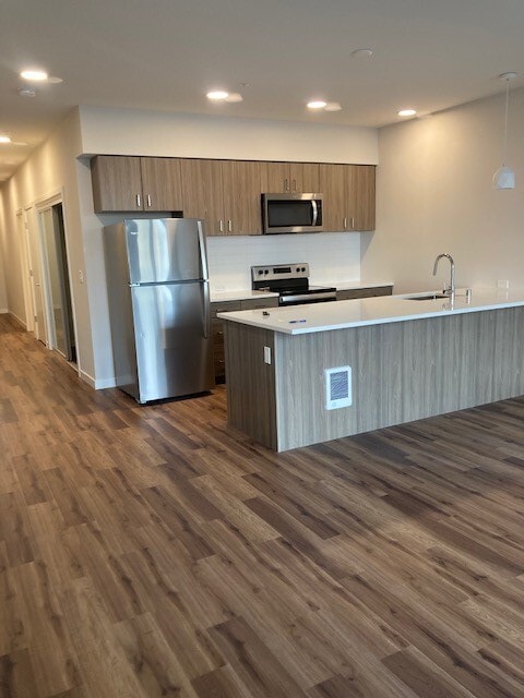 Kitchen with Island - Marquee Apartments