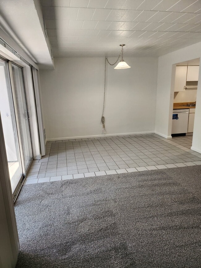 Bristol Dining Area with Balcony View, Spacious 1BR - The Bristol