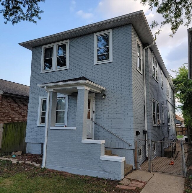 Building Photo - 5521 W 63rd Pl Unit G