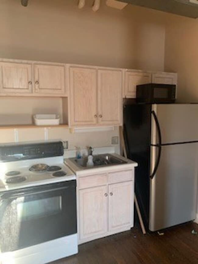Photo - Downtown Studio at Riverviews — Exposed Brick & City Views