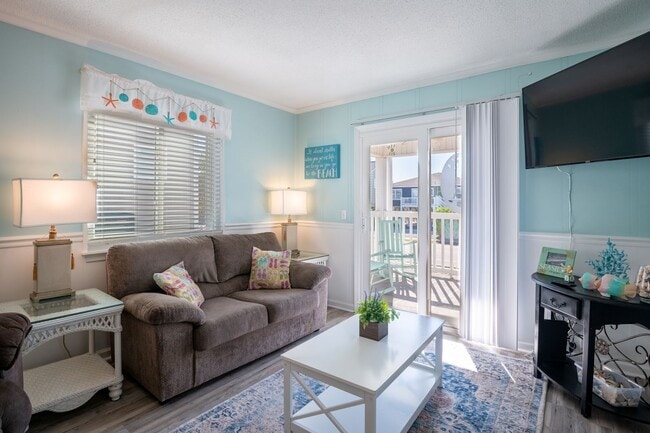 Photo - THIS OFF-SEASON MONTHLY RENTAL WILL HELP WITH THOSE WINTER BLUES Unit F1