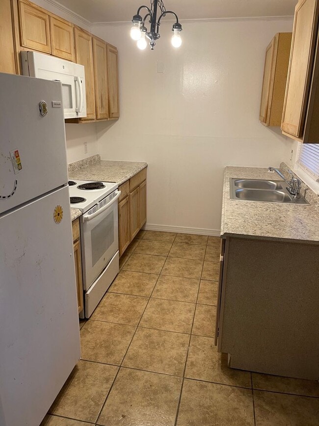 Photo - 3bed house in the county! Central all electric hvac, laundry, yard and hardwoods.