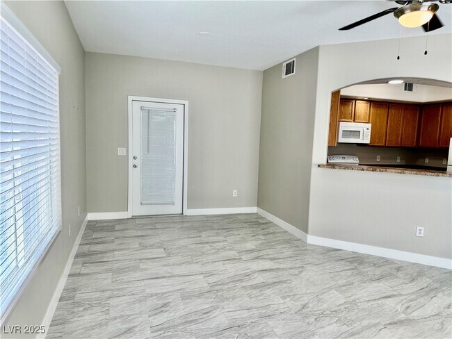 Building Photo - 6160 Rumrill St Unit 113