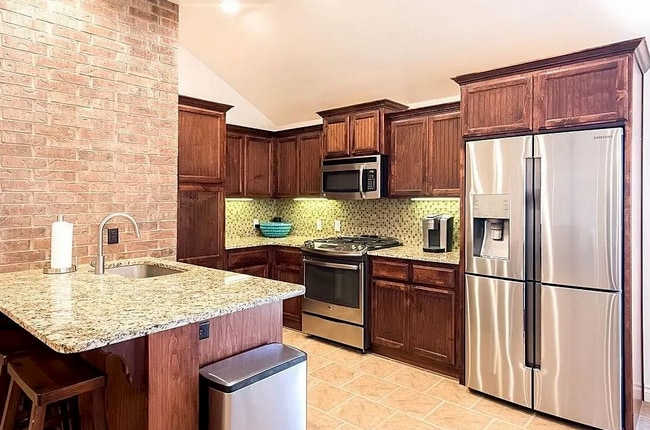 Open layout kitchen with island - 2452 NW 190th St