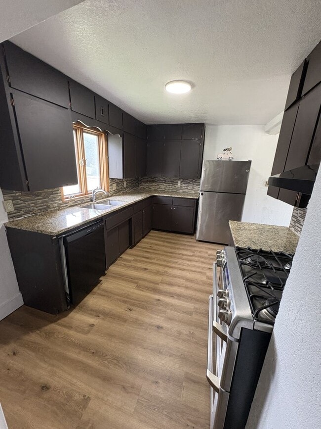 Building Photo - Updated 2 Bed, 2 Bath House for Rent with 2 Stall Garage!!!