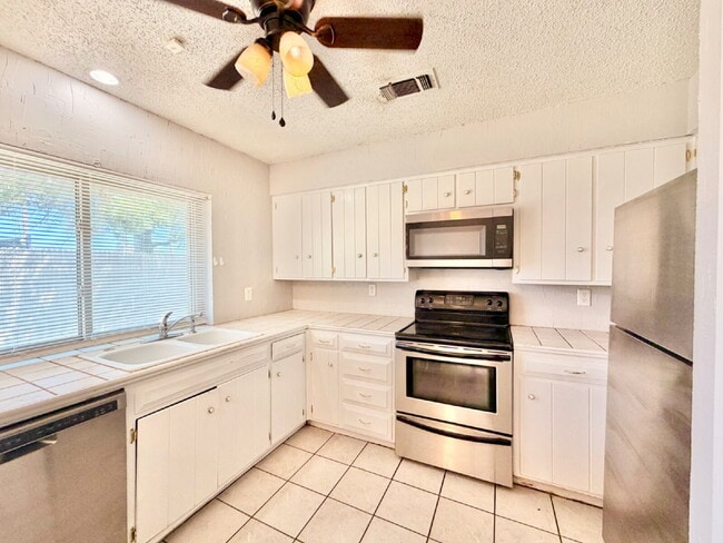 Photo - "Charming 3-Bedroom Home with 2 Full Baths in Lubbock's Heart – 1277 Sq Ft of Comfort Await!"