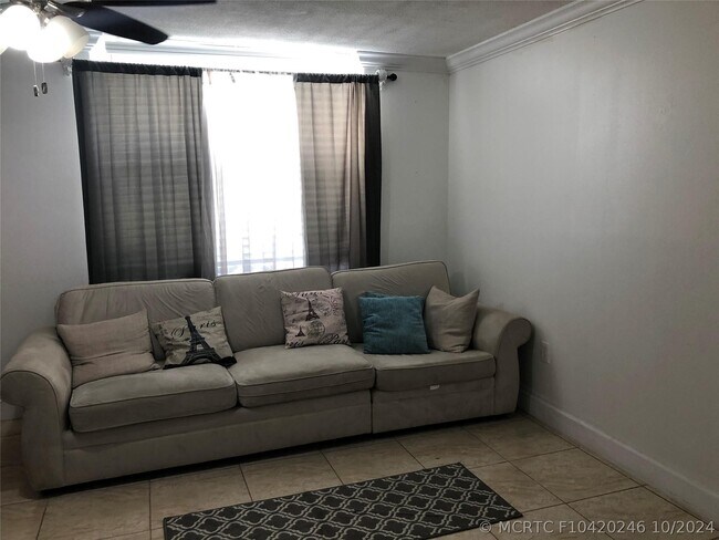 9091 Lime Bay Blvd Unidad 203