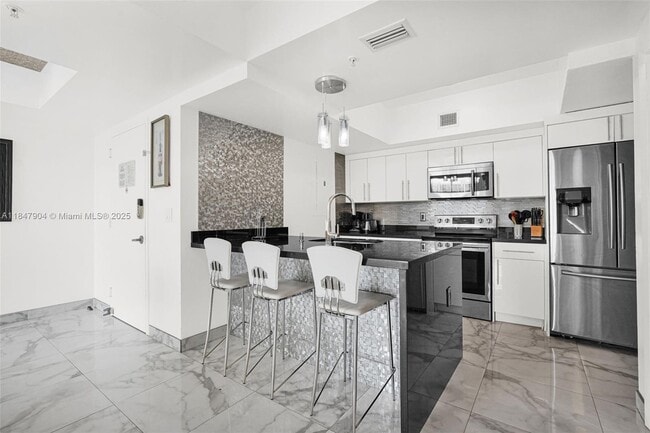 Building Photo - 17555 Atlantic Blvd Unit 504 Rental