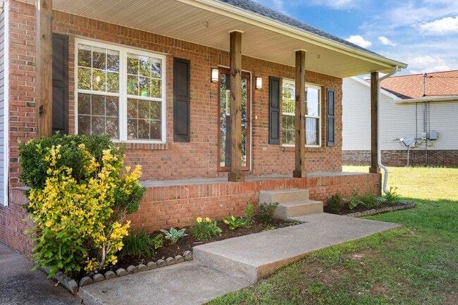 Photo - Charming Brick Home with Soaring Ceilings & Updated Finishes!