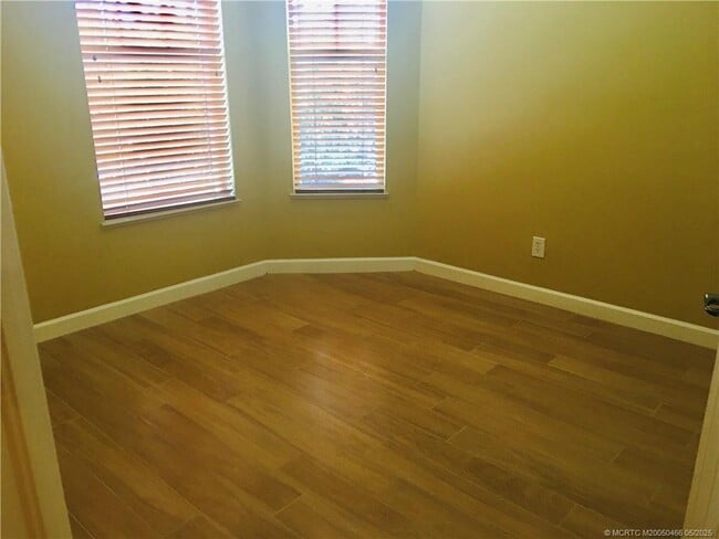 Building Photo - 3582 SW Sawgrass Villas Dr Rental
