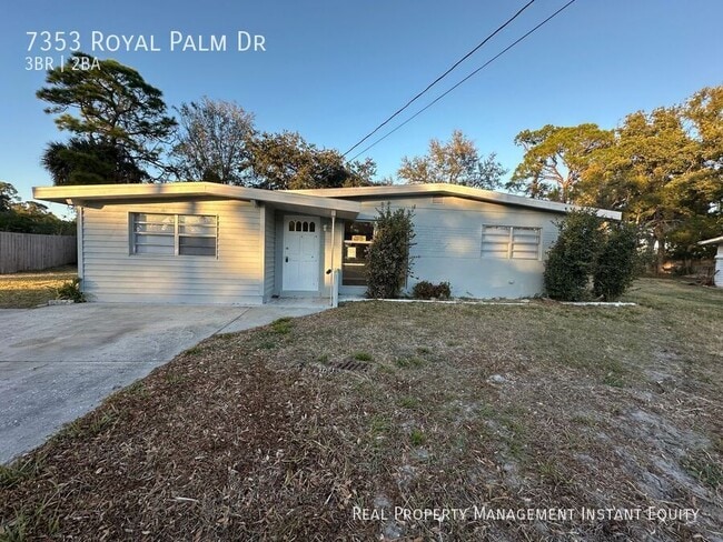 Building Photo - 7353 Royal Palm Dr
