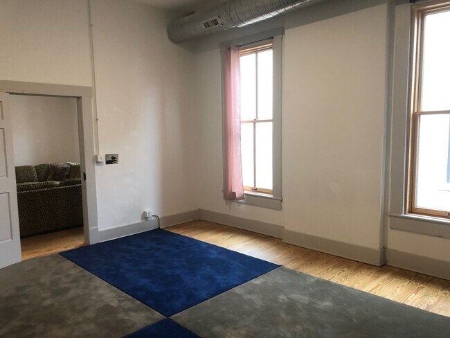 bedroom - 123 E 3rd St Unit 202