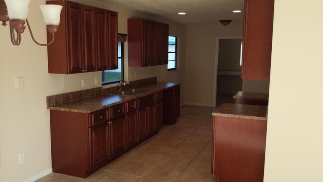 Photo - 3/2/1 with screened in patio/pool