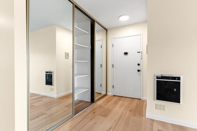 Photo - Modern Oakland Living: New Floors, Private Balcony, and Parking