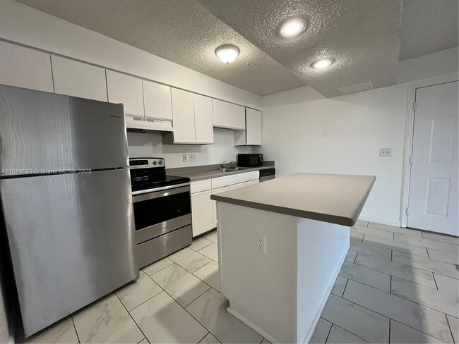Building Photo - 3985 W McNab Rd Unit A101