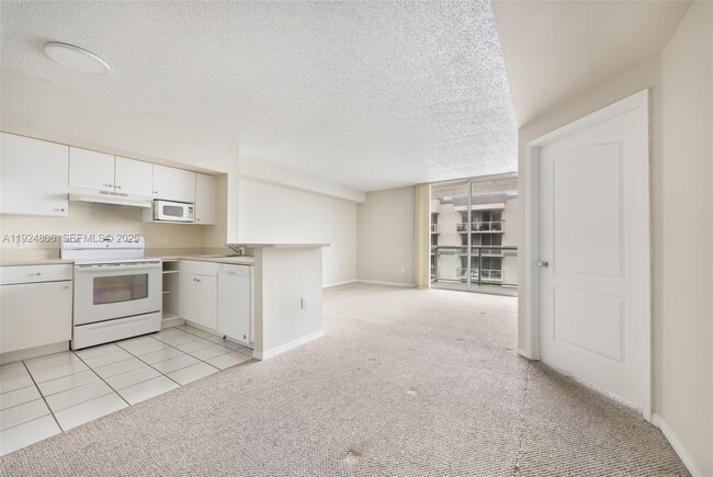 Building Photo - 5085 NW 7th St Unit PH12