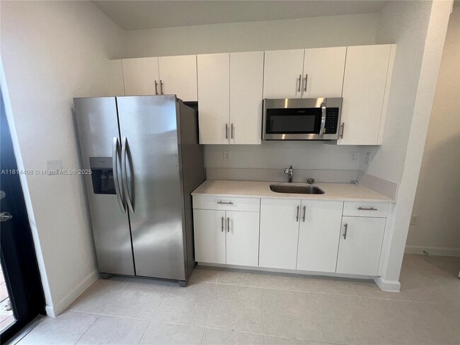 Photo - 11751 SW 248th Terrace Apartment Unit Side