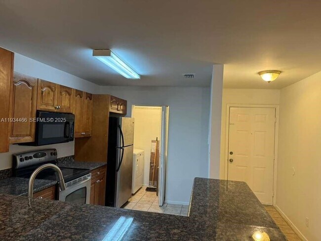 Photo - 11211 W Atlantic Blvd Unidad 208