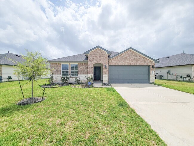 Photo - This stunning 4-bedroom, 2-bathroom Rosharon lease features modern upgrades, an open-concept layo...