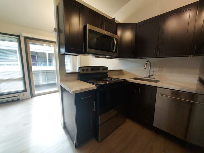 Photo - North Seattle 1BR with Private Balcony, Natural Light, and Modern Flooring Unit 16