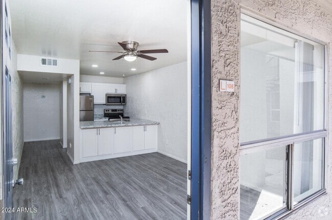 Building Photo - 4635 N 27th Ave Unit Apt 208