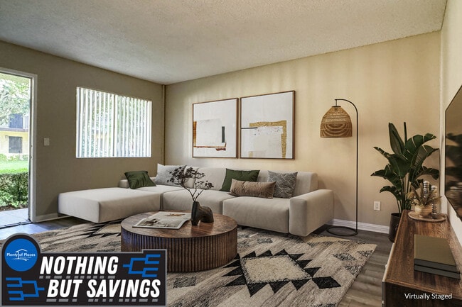 1 BR, 1 BA - Living Room - Orange Terrace Apartments