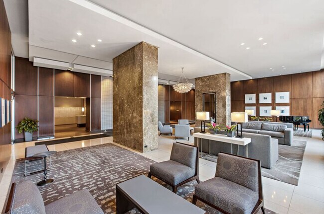 Sitting area in lobby - 655 W Irving Park Rd Unit 3808