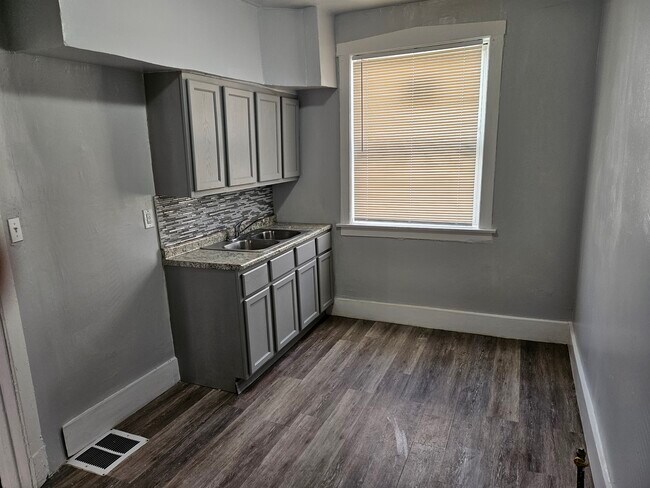 Photo - 1340 W 70th St Apartments