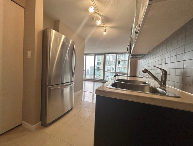 Photo - 9981 Whalley Blvd Unit 3401