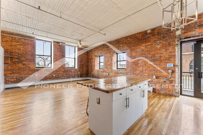 Photo - Charming Downtown Condo Unit with 2 Includ...